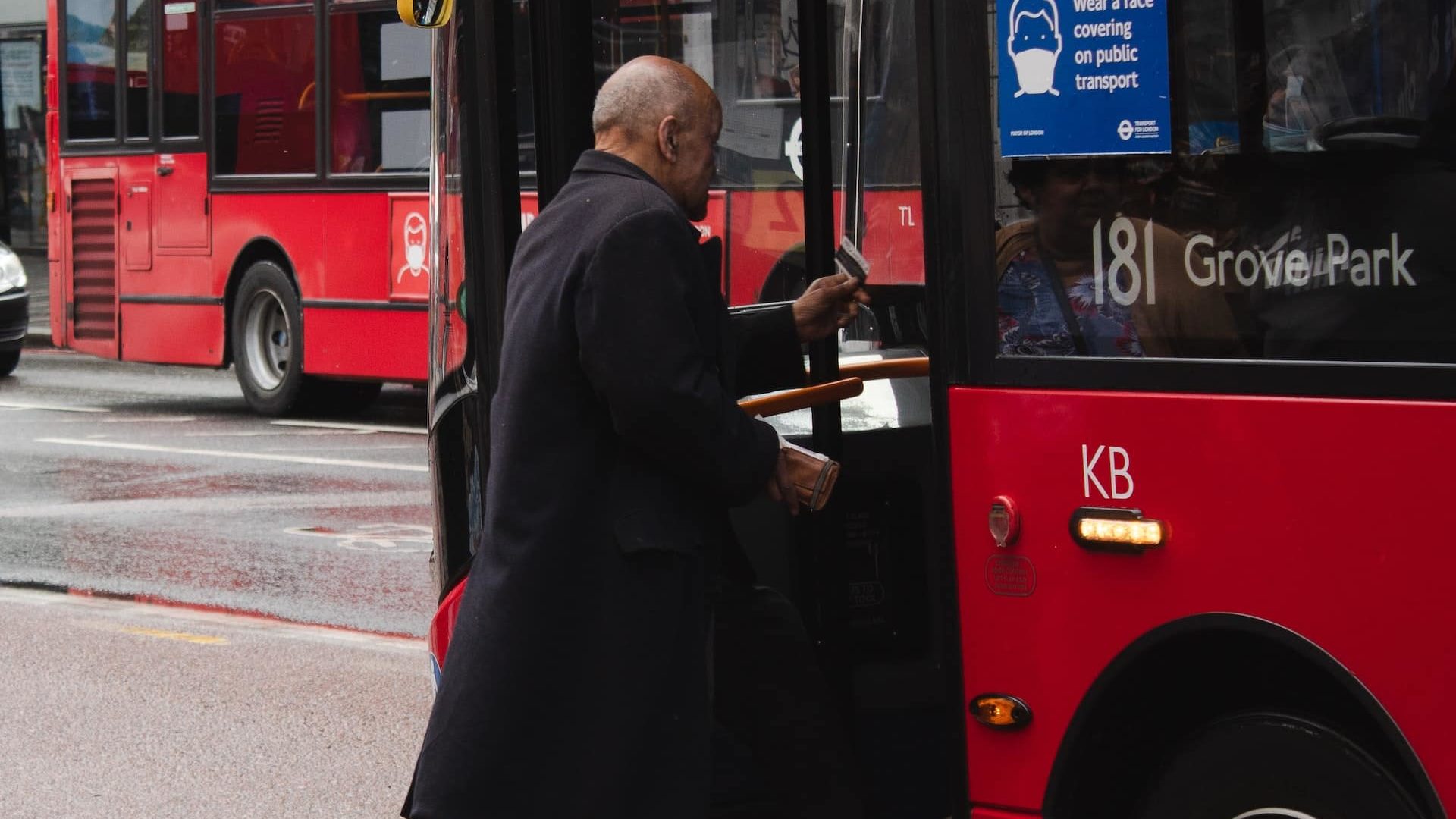 Man stepping onto a bus