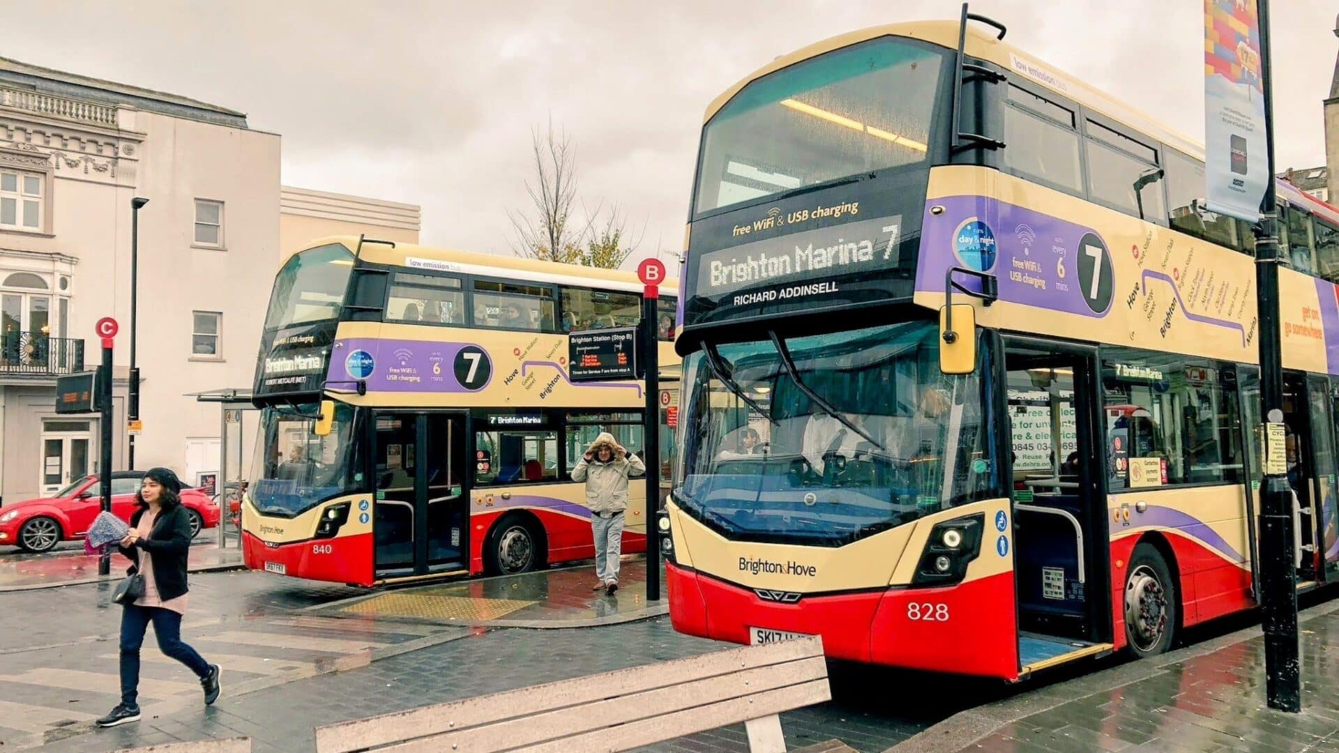 Two double decker Brighton & Hove Buses outside Brighton railway station
