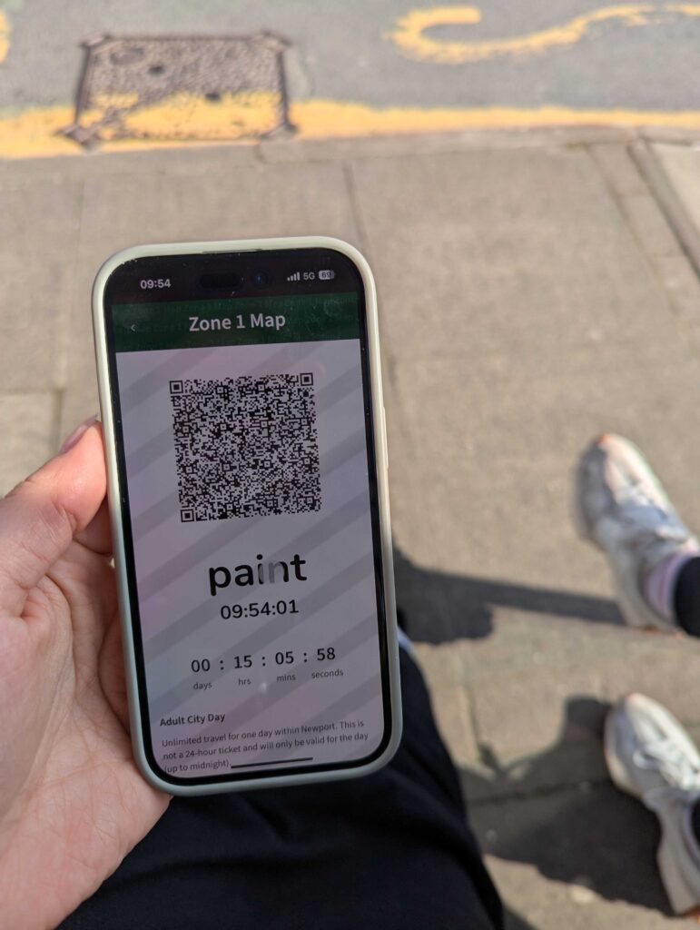 A mobile phone displaying a mobile ticket in the Newport Bus app